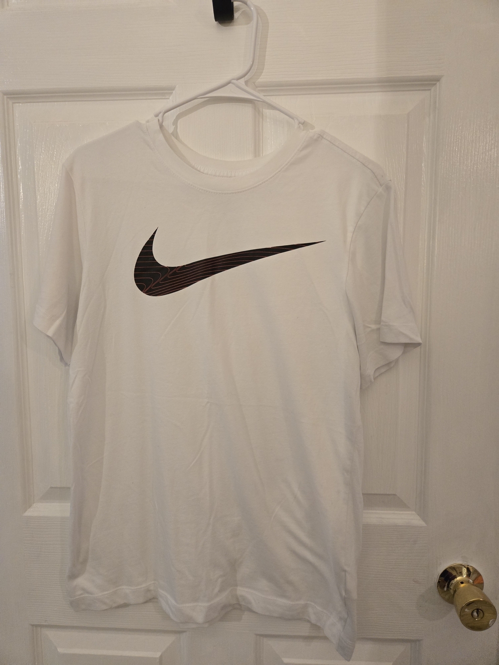 Nike White T‑Shirt with Black Wavy Swoosh